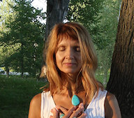 Adrianna meditating in the park